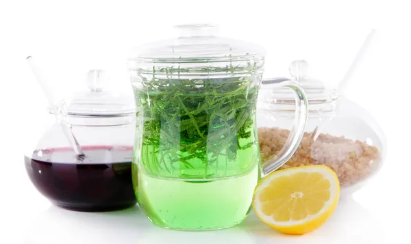 Bebida estragón con limón y azúcar morena aislada en blanco —  Fotos de Stock