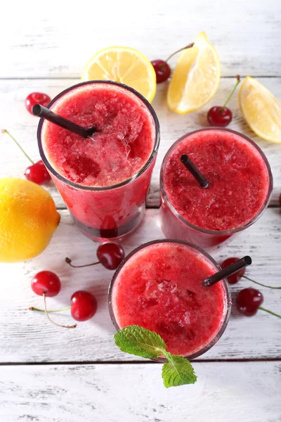 Fresh cold cherry cocktail with mint and lemon — Stock Photo, Image