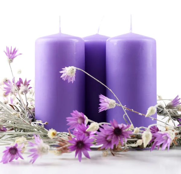 Candles with dried flowers isolated on white — Stock Photo, Image