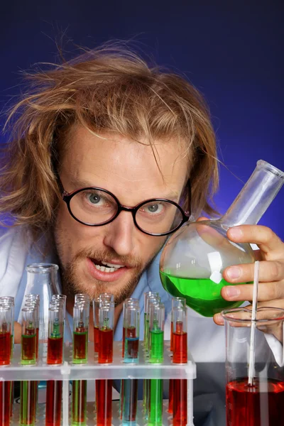 Crazy scientist in laboratory — Stock Photo, Image