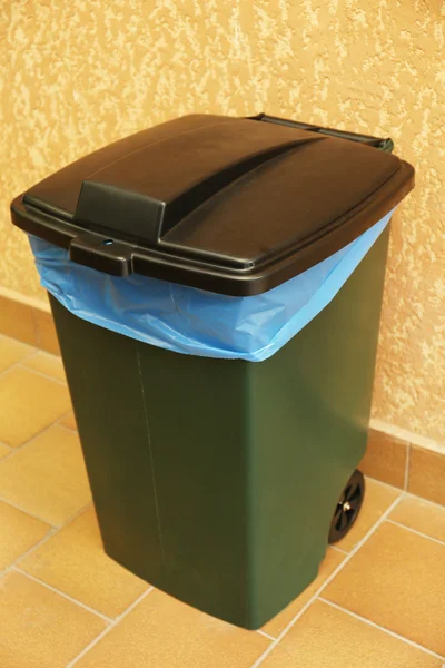 Recycling bin on wall background — Stock Photo, Image