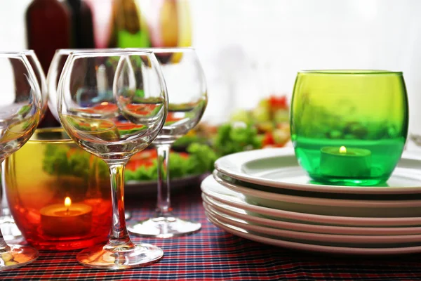 Restaurant table setting with candles — Stock Photo, Image