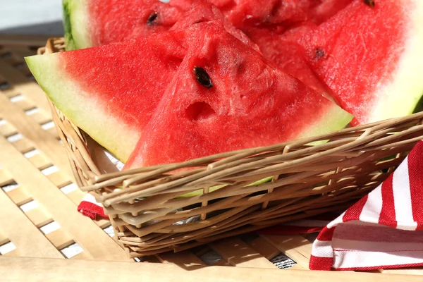 Fresh slices of watermelon on table, outdoors — Stock Photo, Image