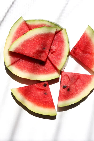 Fresh slices of watermelon on table, outdoors — Stock Photo, Image