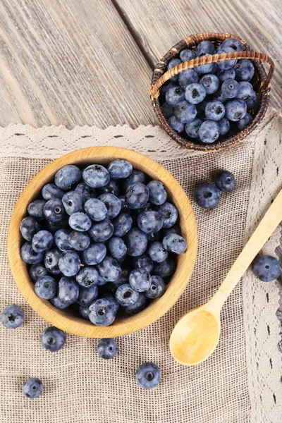 Fresh blueberries on wooden table — Stock Photo, Image