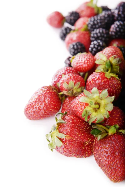 Blackberries and strawberries isolated on white — Stock Photo, Image