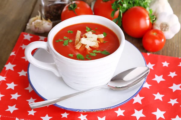 Tasty tomato soup with croutons on table close-up — Stock Photo, Image