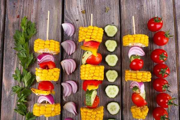 Sliced vegetables on picks on table close-up — Stock Photo, Image
