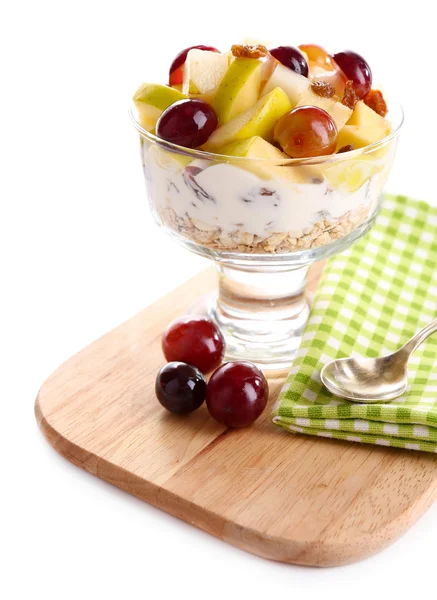 Healthy breakfast - yogurt with  fresh grape and apple slices and muesli served in glass bowl on wooden tray, isolated on white — Stock Photo, Image