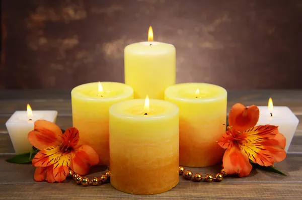 Beautiful candles with flowers — Stock Photo, Image