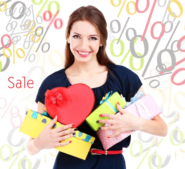 Tiempo de compra.Mujer atractiva con cajas de regalo — Foto de Stock