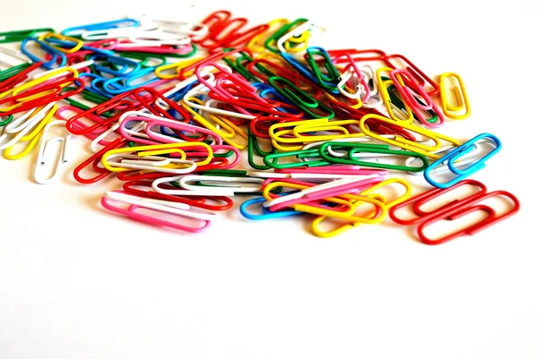 A colorful paper clip against a white background — Stock Photo, Image