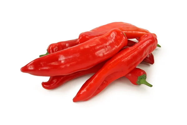 Två röd paprika på vit bakgrund — Stockfoto