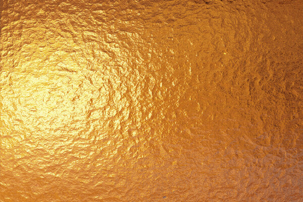 Очень большой лист тонкой морщинистой золотой фольги
