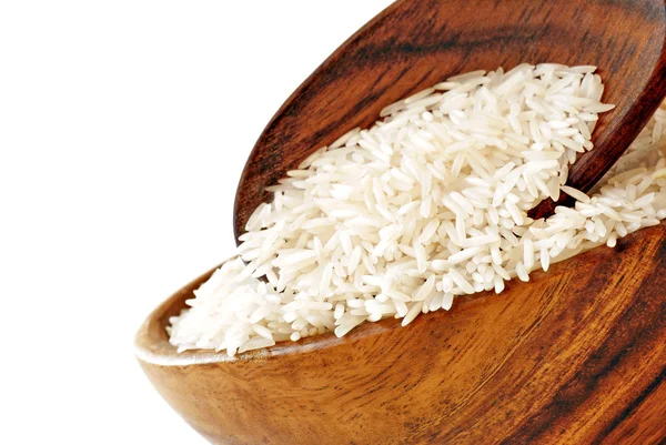 Arroz em uma tigela em um fundo branco — Fotografia de Stock