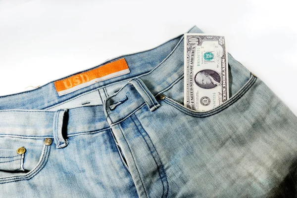 Банкноти в кишені джинсів — стокове фото