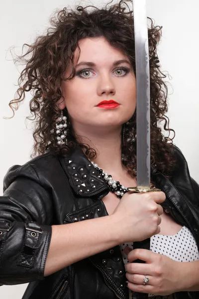 Curly woman curly girl and sword — Stock Photo, Image