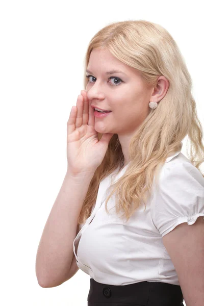Mulher escutando com a mão atrás de sua orelha — Fotografia de Stock