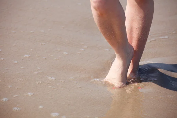 Nice legs in water — Stock Photo, Image