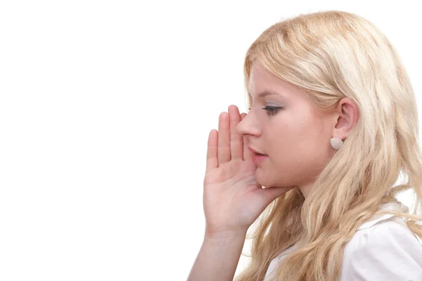 Vrouw afluisteren met hand achter haar oor — Stockfoto