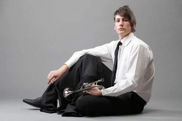 Portrait of a young man and his Trumpet — Stock Photo, Image