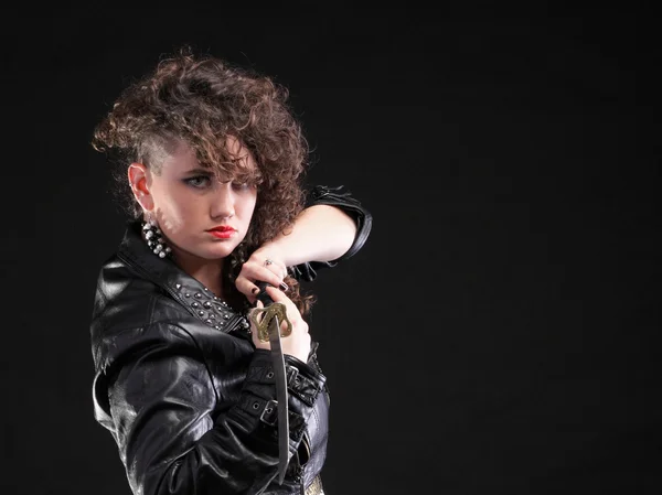 Piercing woman curly girl and sword — Stock Photo, Image
