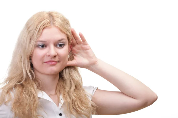 Woman eavesdropping with hand behind her ear — Stock Photo, Image