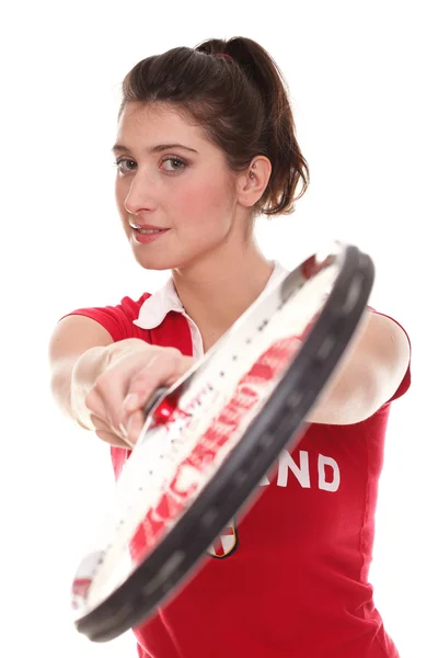 Geïsoleerde studio foto van een jonge vrouw met tennisracket — Stockfoto