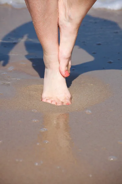 Nice legs in water — Stock Photo, Image