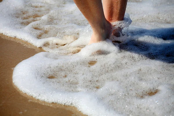 Nice legs in water — Stock Photo, Image