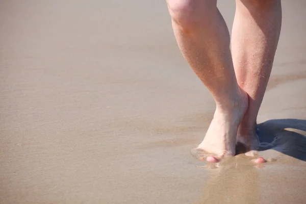 Nice legs in water — Stock Photo, Image