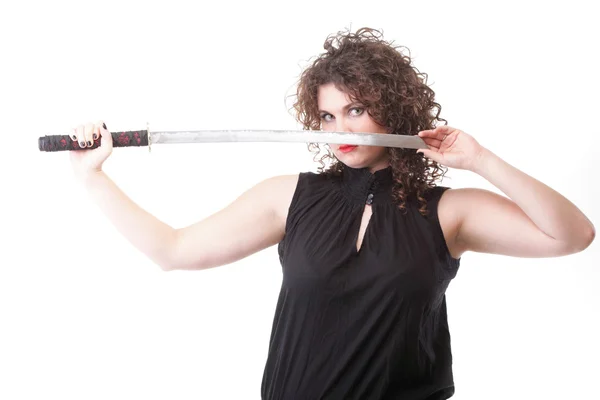 Portrait curly woman curly girl and sword — Stock Photo, Image