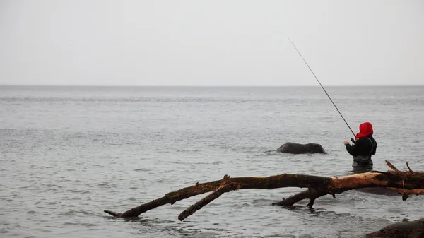 Fisherman Stones in sea water autumn sea