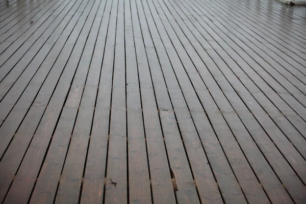 Brown wood in rain texture — Stock Photo, Image
