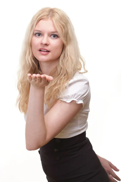 Beautiful young woman blowing a kiss — Stock Photo, Image