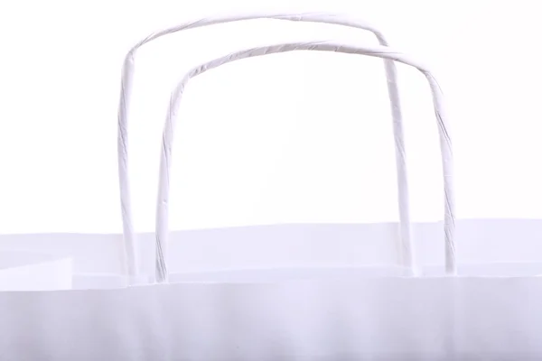 Vásárlási fehér ajándék táskák és az apple elkülönített — Stock Fotó