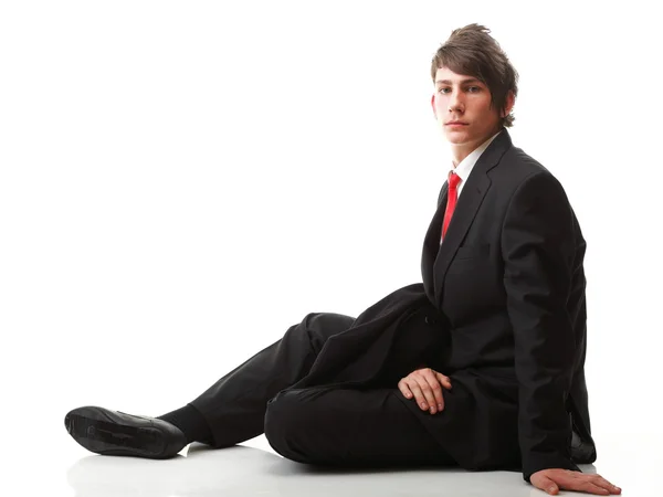 Young businessman black suit casual tie on white background — Stock Photo, Image