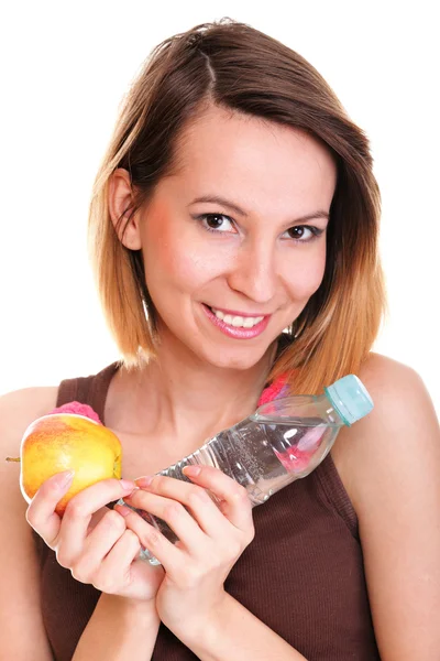 Mooi meisje drinkwater uit blauwe fles geïsoleerd — Stockfoto