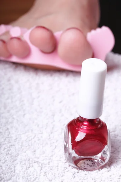 Female feet red polished nails — Stock Photo, Image