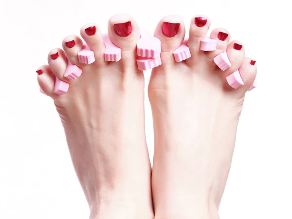 Female feet red polished nails — Stock Photo, Image