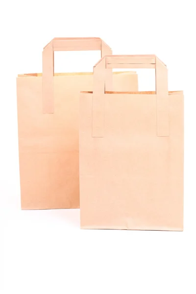 Shopping brown gift bags isolated — Stock Photo, Image