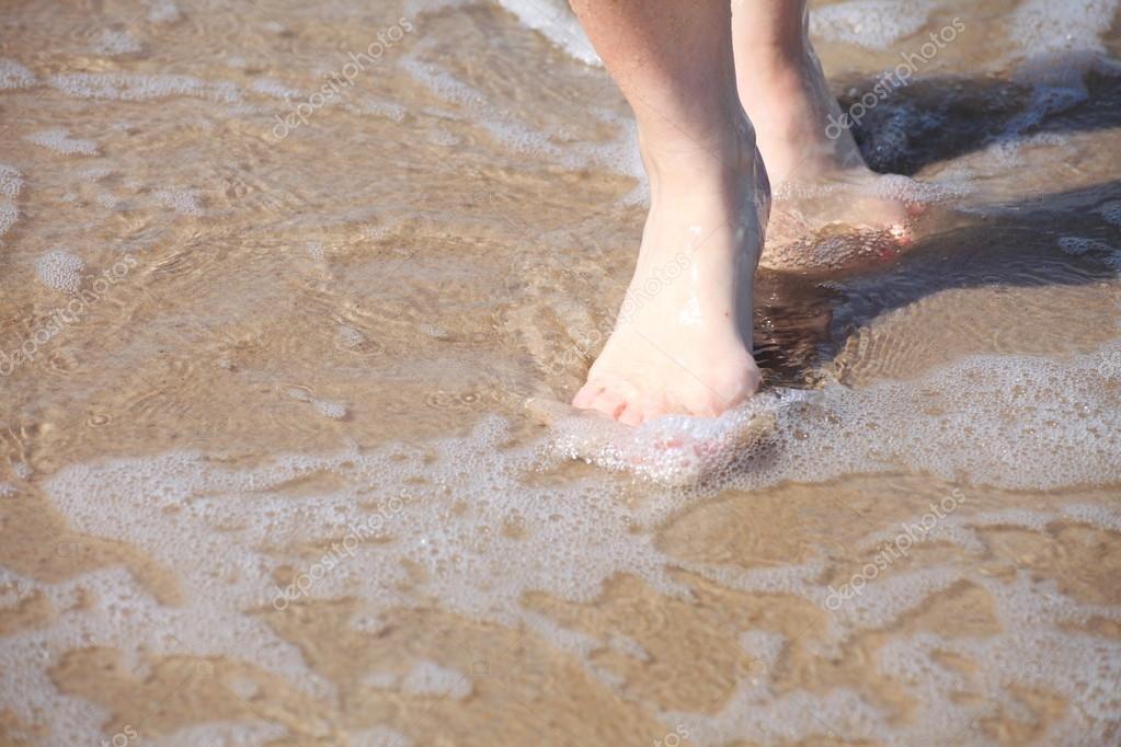 Toes in the water ass in the sand men's beach