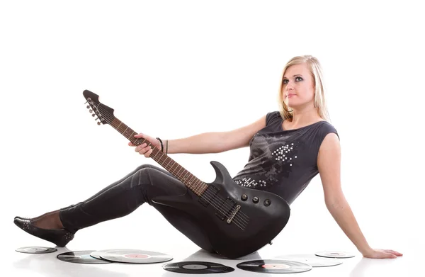 Woman with guitar headphones listening to music isolated white b — Stock Photo, Image