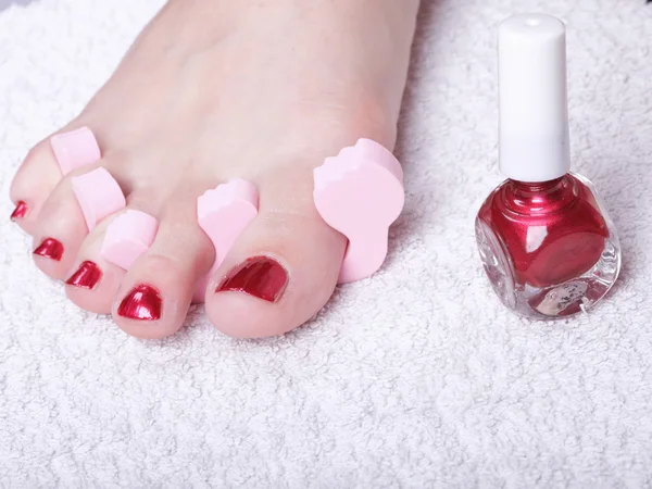 Female feet red polished nails — Stock Photo, Image