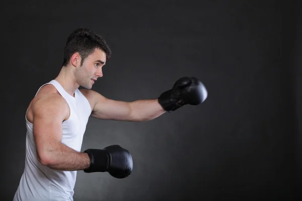 Portrait sportsman boxer in studio dark background — Stock Photo, Image