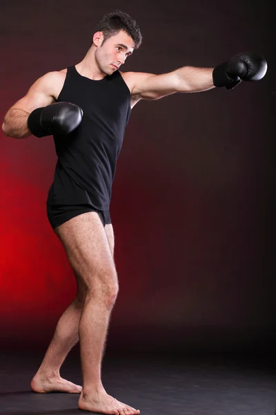 Strong athletic muscle man sports guy showing his muscles — Stock Photo, Image