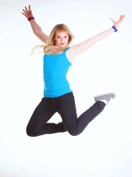 Jonge vrouwelijke gelukkig vrouw springen met armen omhoog geïsoleerde — Stockfoto