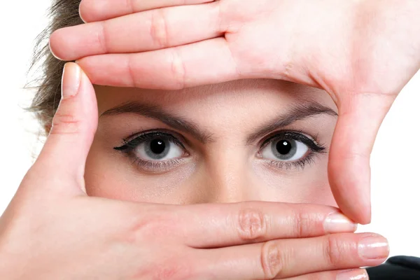 Geschäftsfrau macht einen Handrahmen, isoliert — Stockfoto