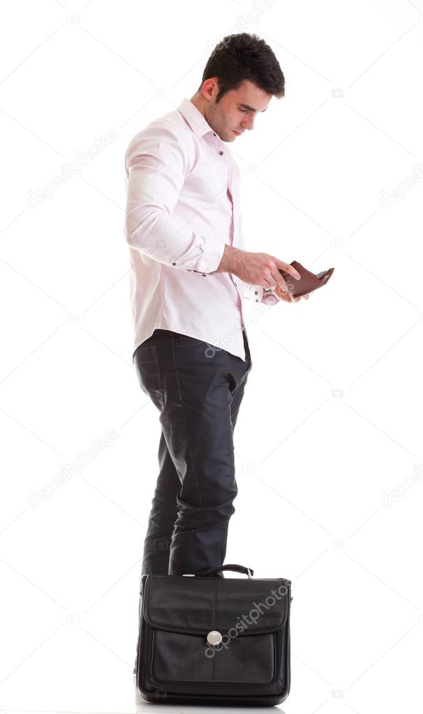 Business man looking at his empty wallet Isolated