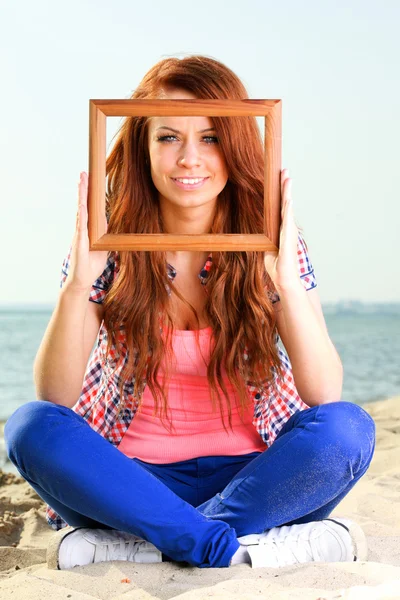 Woman Holding Frame travel concept — Stock Photo, Image